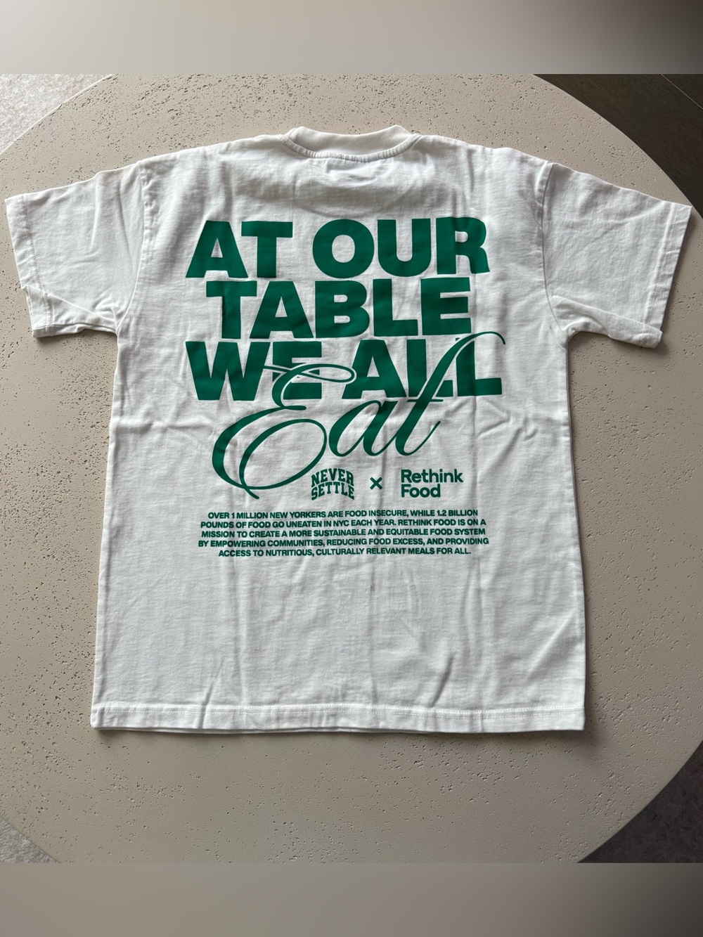 "At Our Table We All Eat" Collab Tee Never Settle * NYC Rethink Food